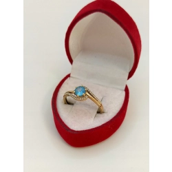 Złoty pierścionek Topaz, diamenty Pr.585 W:1,65gr Rozm.15