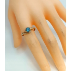 Złoty pierścionek Topaz, diamenty Pr.585 W:1,65gr Rozm.15