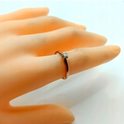 Złoty pierścionek z Brylantem Yes Pr,585 W:1,55 R.12 0,12ct