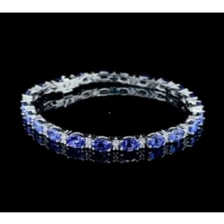 Złota bransoletka Tanzanity i Diamenty 0,35ct Pr.585 W:9,24gr 19cm