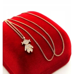 Złoty łańcuszek z zawieszką dziewczynka Diamenty 0,22ct Pr.750 W:3,70gr