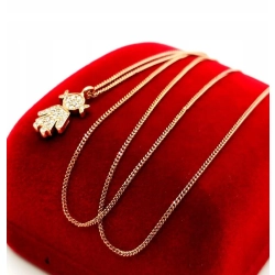 Złoty łańcuszek z zawieszką dziewczynka Diamenty 0,22ct Pr.750 W:3,70gr