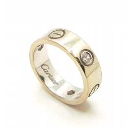 Złota obrączka zdobiona z cyrkoniami szer.5,5mm Pr.585 W:6,30gr Roz.12