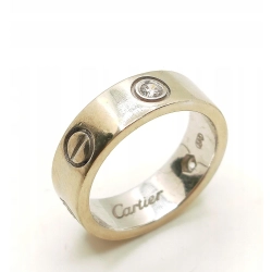 Złota obrączka zdobiona z cyrkoniami szer.5,5mm Pr.585 W:6,30gr Roz.12