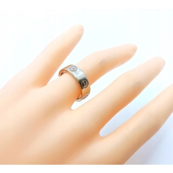 Złota obrączka zdobiona z cyrkoniami szer.5,5mm Pr.585 W:6,30gr Roz.12