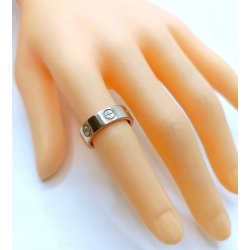 Złota obrączka zdobiona z cyrkoniami szer.5,5mm Pr.585 W:6,30gr Roz.12