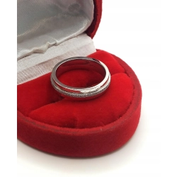 Złoty pierścionek Tiffany T z diamentami 0,13ct Pr.750 W:6,03gr Roz.12