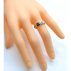 Złoty pierścionek Tiffany T z diamentami 0,13ct Pr.750 W:6,03gr Roz.12