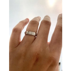 Złoty pierścionek Tiffany T z diamentami 0,13ct Pr.750 W:6,03gr Roz.12