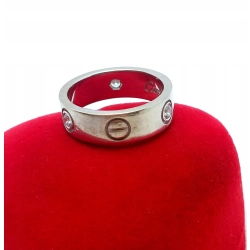 Złota obrączka zdobiona z cyrkoniami szer.5,5mm Pr.585 W:6,30gr Roz.12