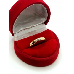 Złoty pierścionek obrączka z cyrkonią Pr.750 W:1,97gr Roz.13