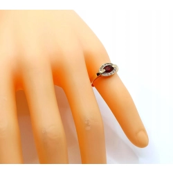 Złoty pierścionek z cyrkoniami czerwone oczko Pr.585 W:2,37gr Roz.9