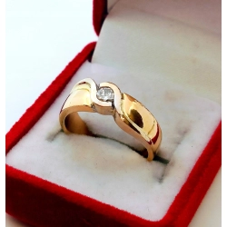 Złoty pierścionek, obrączka z Diamentem 0,17ct Pr.750 W:6,33gr Roz.13