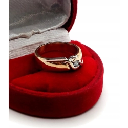 Złoty pierścionek, obrączka z Diamentem 0,17ct Pr.750 W:6,33gr Roz.13