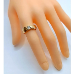 Złoty pierścionek, obrączka z Diamentem 0,17ct Pr.750 W:6,33gr Roz.13
