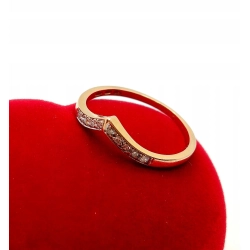 Złoty pierścionek z Diamentami 0,07ct Pr.750 W:1,48gr Roz.12