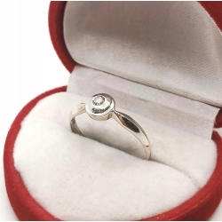 Złoty pierścionek z Diamentem 0,07ct Pr.585 W:1,87gr R.16