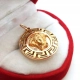 Złota zawieszka okrągła z głową meduzy Pr.750 W:3,08gr Śred.2cm