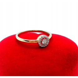 Złoty pierścionek z Diamentami 0,13ct Pr.585 W:1,71gr Roz.15