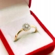 Złoty pierścionek z Diamentami 0,13ct Pr.585 W:1,71gr Roz.15