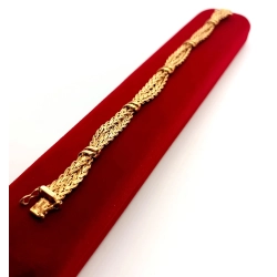 Złota bransoletka UNOAERRE plecione kłosy Pr.375 W:18,71gr Dł:19cm Szer.1cm